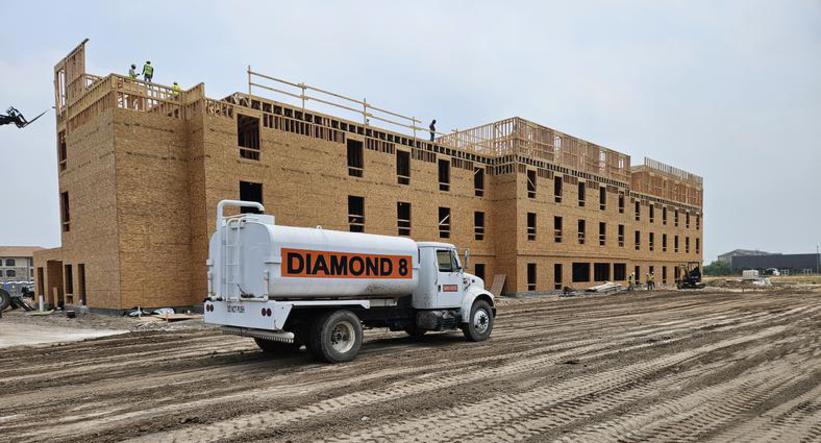 Diamond 8 water truck — commercial construction site